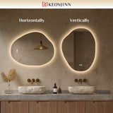 Keonjinn Asymmetrischer beleuchteter Badezimmerspiegel mit Lichtern, LED-Spiegel in unregelmäßiger Form mit gehärtetem HD-Glas, UL-gelisteter LED-Treiber, 3 Farbtemperaturen, dimmbar, Memory-Funktion, sichere Entnebelung