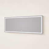 95.7 x 35.8-inch rectangular LED mirror with a slim silver frame and glowing white border on a beige wall.
